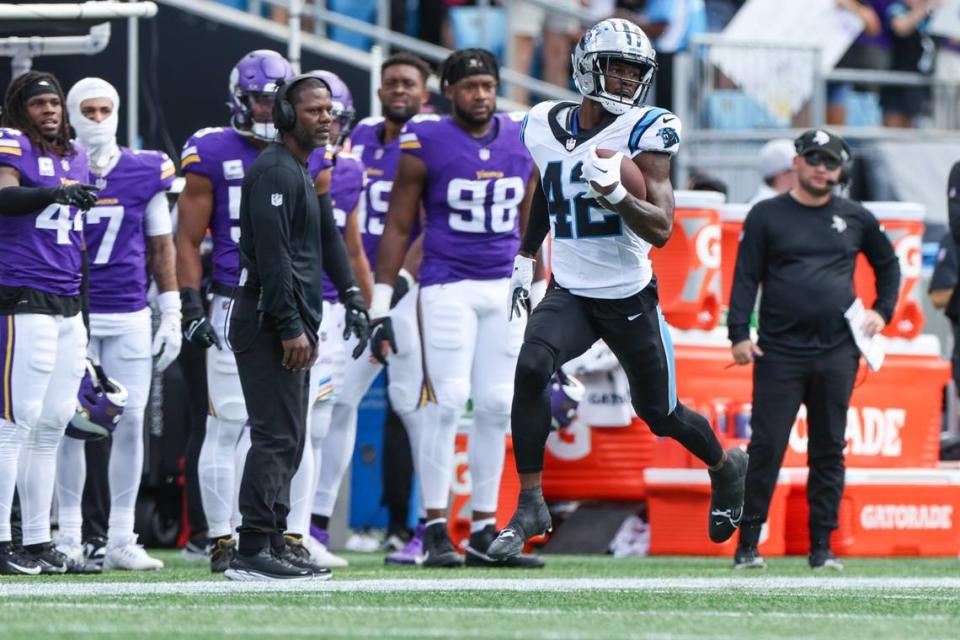 Panthers saftey Sam Franklin, Jr. runs the ball to the end zone after intercepting a pass during the game against Minnesota at Bank of America Stadium on Sunday, October 1, 2023 in Charlotte, NC.