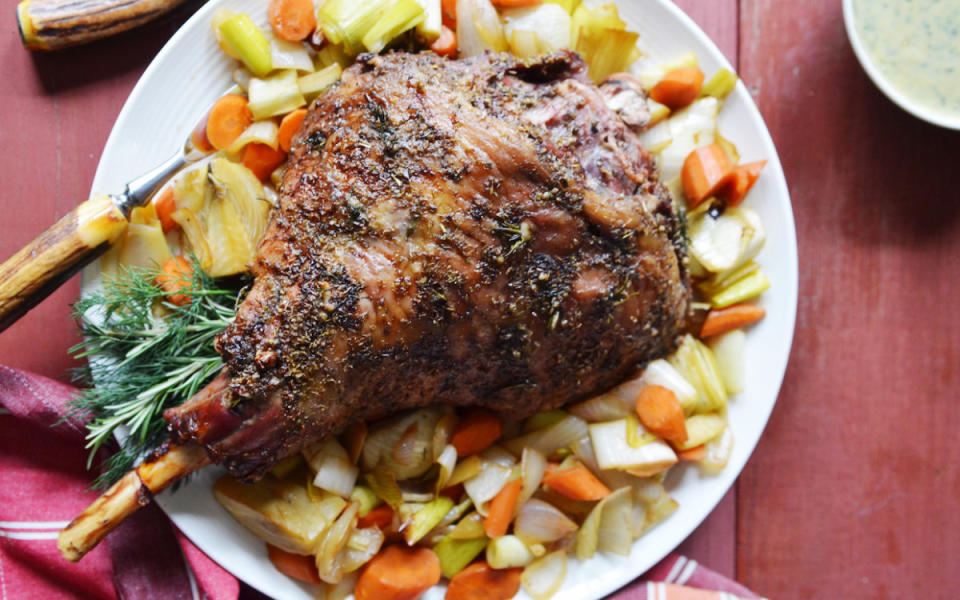 <p>Madeleine Hill</p><p>Celebrity chef Andrew Zimmern's game-day spread always includes a <a href="/1104951/parade/hearty-pot-roast" data-ylk="slk:roast;elm:context_link;itc:0;sec:content-canvas" class="link ">roast</a>—turkey, ham or this Greek-style lamb. </p><p><strong>Get the recipe: <a href="/631423/alison-ashton/roast-let-of-lamb-with-lemony-dill-sauce/" data-ylk="slk:Roast Leg of Lamb with Lemony Dill Sauce;elm:context_link;itc:0;sec:content-canvas" class="link ">Roast Leg of Lamb with Lemony Dill Sauce</a></strong></p>