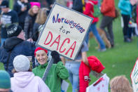 <p>Referencing a scandal over Trump’s immigration comments, the sign implies, Norwegian people in support for DACA program at Portland’s National March for Impeachment on Jan. 20, 2018, in downtown Portland, Ore. (Photo: Diego Diaz/Icon Sportswire via Getty Images). </p>