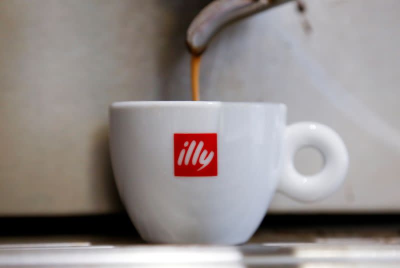 FILE PHOTO: Coffee flows into a Illy cup at a coffee shop in Rome