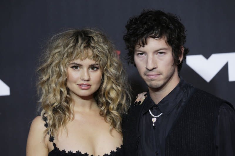 Debby Ryan, seen with Josh Dun, stars in "Howdy, Neighbor!" File Photo by John Angelillo/UPI