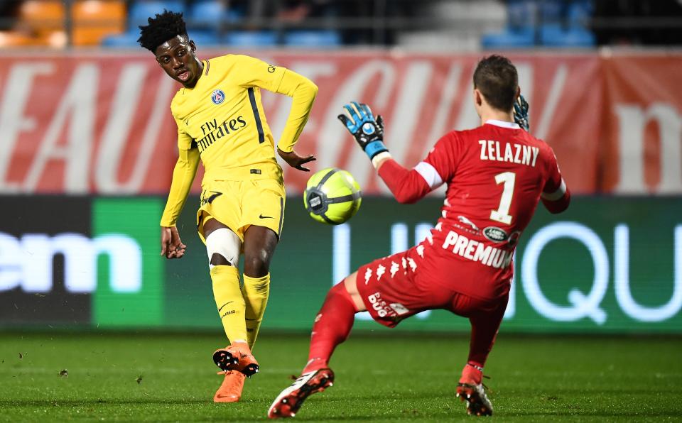 Budding USMNT star Timothy Weah, left, made his first-team debut for Paris Saint-Germain on Saturday. (Getty)