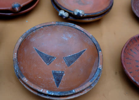 Ceramic pieces are displayed as part of an archeological finding, dated approximately 500 years ago in Mazo Cruz, near Viacha, Bolivia, November 12, 2018. Picture taken November 12, 2018.REUTERS/David Mercado