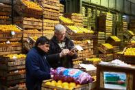 Argentines face daily race for deals as inflation soars above 100% in Buenos Aires, Argentina