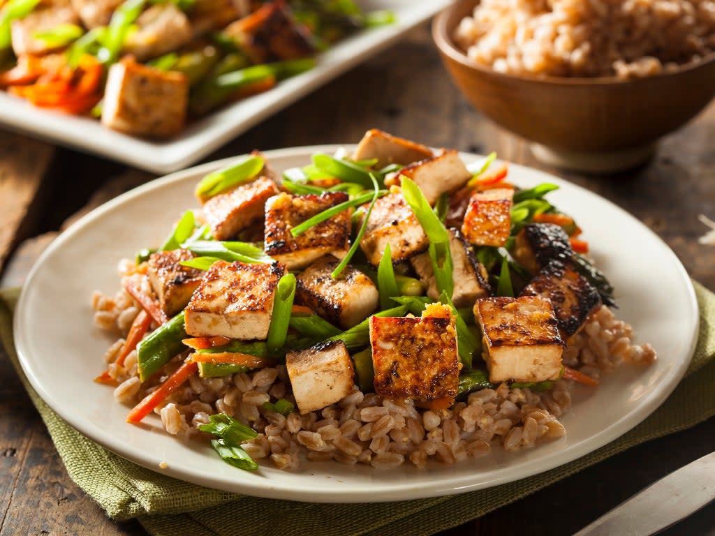 The dark, star-anise-spiced caramel sauce is absorbed by the tofu and rice  (Getty/iStock)