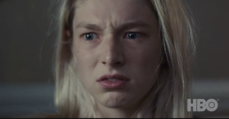 Hunter Schafer in a close-up shot, looking concerned, from an HBO series