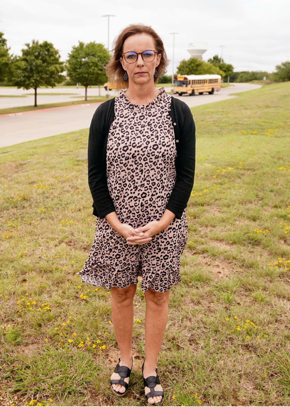 Shawna Jensen stands for a portrait in Mansfield, Texas, on Thursday, Sept. 24, 2020. Over the course of Donald Trump’s first term, as Jensen grew more alarmed by the president’s actions, her stance on many issues started to shift. She began to read different news sources, scour new types of books. She watched MSNBC along with Fox News, and read about media bias and immigration. (AP Photo/LM Otero)