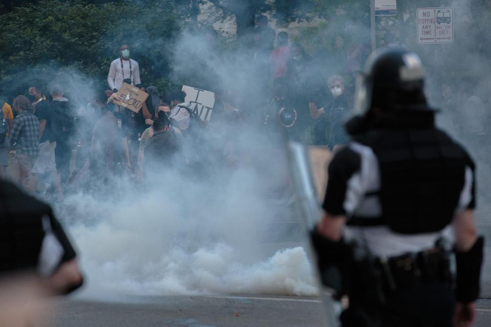 Protesters disperse Downtown after Columbus police officers deployed tear gas on May 30.