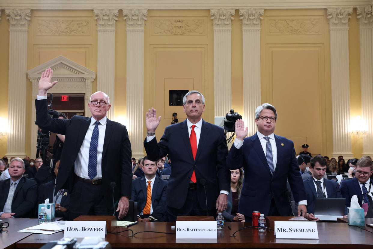 Rusty Bowers, Arizona House speaker, from left, Brad Raffensperger, Georgia's secretary of state, and Gabriel Sterling, Georgia's secretary of state chief operating officer, each raise their right hand as they are sworn in for the hearing.