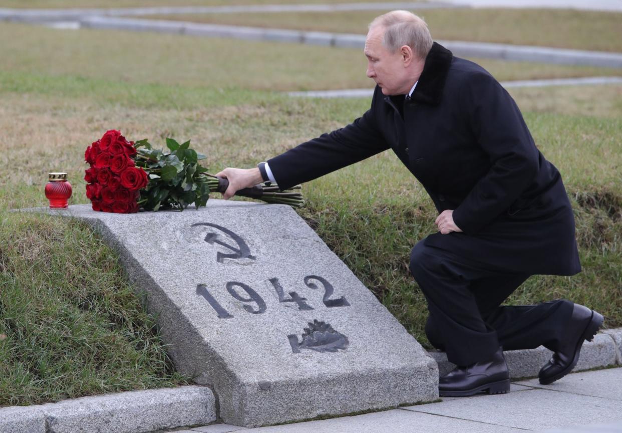 Russian President Vladimir Putin attends a wreath laying commemoration ceremony for the 75th anniversary since the Leningrad siege was lifted during World War Two, at the Bounday Stone east of Saint Petersburg on 18 January: Sputnik/AFP via Getty Images