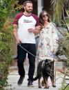 <p>Ben Affleck and girlfriend Ana de Armas walk their dogs arm-in-arm on Tuesday in L.A.</p>