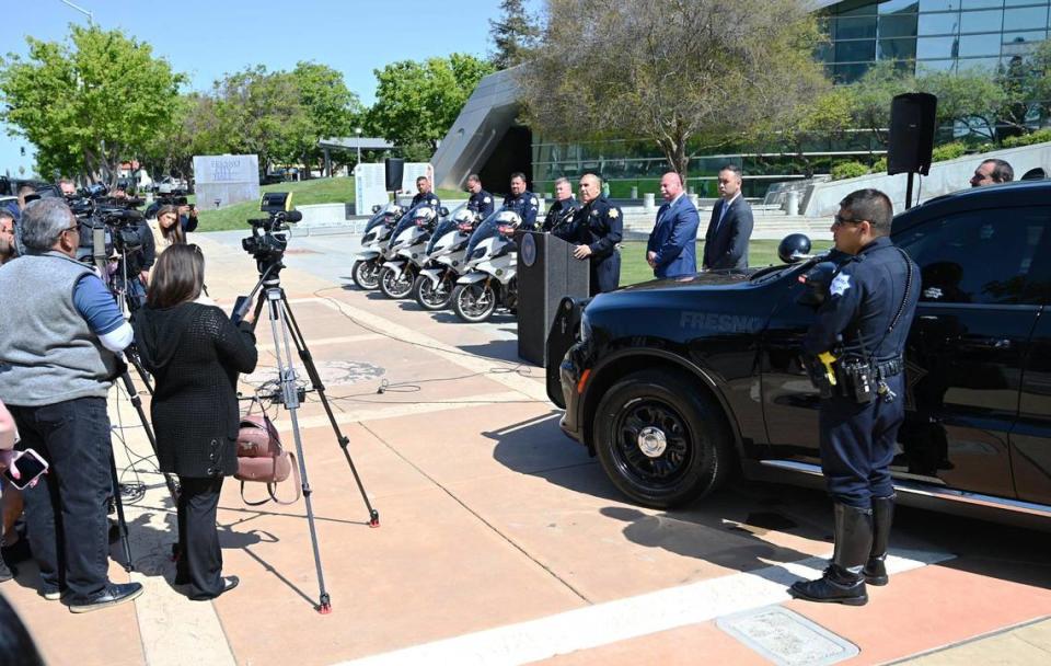 Mayor Jerry Dyer, Chief of Police Paco Balderrama and councilmember Garry Bredefeld lead a press conference about a proposed ordinance that would fine those who atend as well as participate in any sideshow in the city, Wednesday, April 19, 2023 in front of Fresno City Hall.