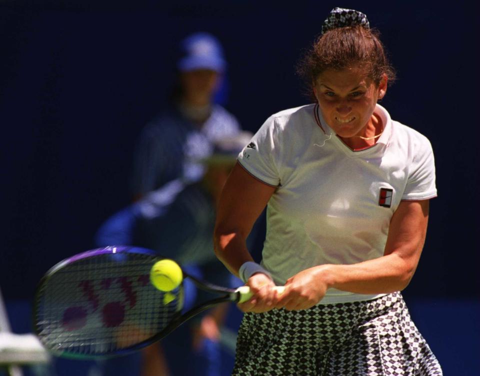 17 JAN 1996:  MONICA SELES OF THE UNITED STATES RETURNS AGAINST KATRINA STUDENIKOVA OF SLOVAKIA DURING THE SECOND ROUND OF THE FORD AUSTRALIAN OPEN AT FLINDERS PARK IN MELBOURNE, AUSTRALIA. SELES WON THE MATCH IN STRAIGHT SETS 6-1, 6-1. Mandatory Credit:Phil Cole/ALLSPORT