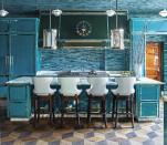 <p><em>ED</em> A-Lister Steven Gambrel is a master of blues, and this <a href="https://www.elledecor.com/design-decorate/house-interiors/a29249446/steven-gambrel-chicago-revivalist-mansion/?" rel="nofollow noopener" target="_blank" data-ylk="slk:Chicago kitchen;elm:context_link;itc:0;sec:content-canvas" class="link ">Chicago kitchen</a> is proof. Gambrel opted to awash the space with Urban Archaeology handmade glass tiles in variations of blue spanning from aquamarine to jade. The polished nickel, hardwood, and glass cabinetry and island are custom, and the range and hood are by Officine Gullo. Hanging from the ceiling are eight circa-1930 C.F. Otto Müller ceiling lights and a pendant designed by Gambrel for the Urban Electric Co. </p>