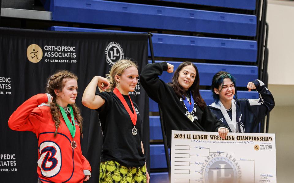Kylee Trostle (ELCO) stands on the podium with her 2nd place 112 lb. medal The Lancaster Lebanon League Wrestling Championships were held at Manheim Township on Saturday January 27, 2024.