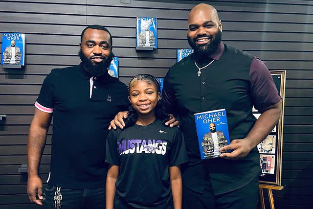 <p>Michael Oher/Instagram</p> Michael Oher poses with fans at Nashville book store during a promotional event for his book "When Your Back's Against the Wall: Fame, Football, and Lessons Learned from a Lifetime of Adversity" in Aug. 2023