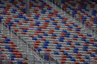 Empty stands are viewed during a NASCAR Cup Series auto race at Atlanta Motor Speedway, Sunday, June 7, 2020, in Hampton, Ga. (AP Photo/Brynn Anderson)