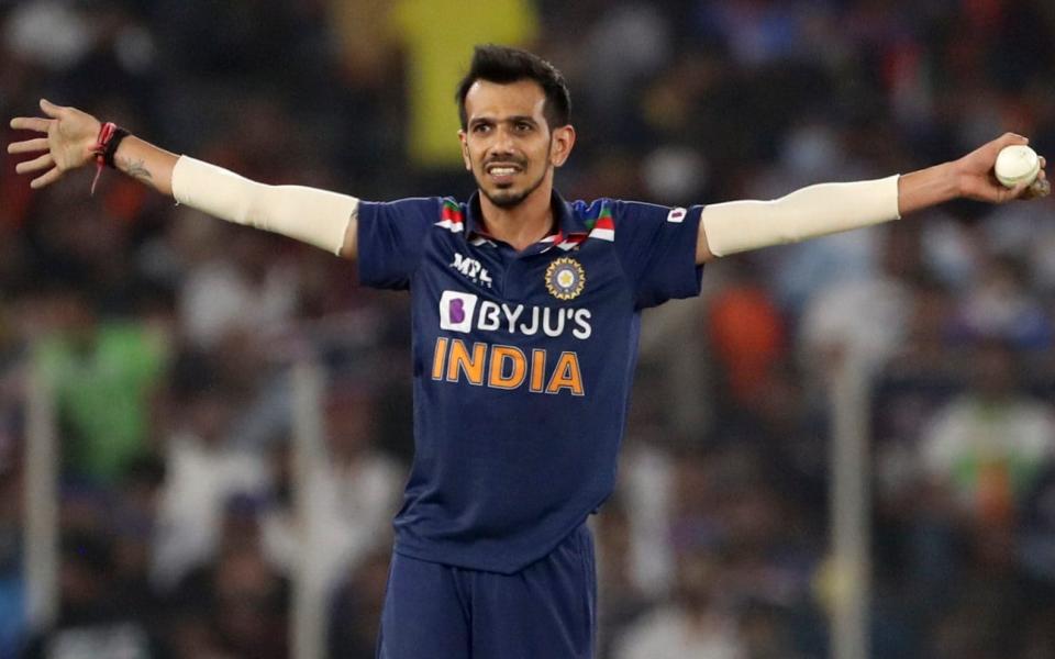 India's Yuzvendra Chahal gestures to teammates between his deliveries during the first Twenty20 cricket match between India and England in Ahmedabad - Aijaz Rahi/AP