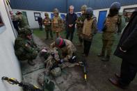 NATO Secretary General Jens Stoltenberg observes Operation Interflex a UK led training programme for the Armed Forces of Ukraine during a visit to Lydd Camp in Kent, Britain.