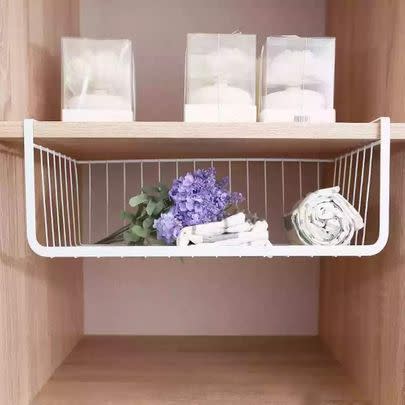 Make use of dead wall space with these under-shelf storage baskets