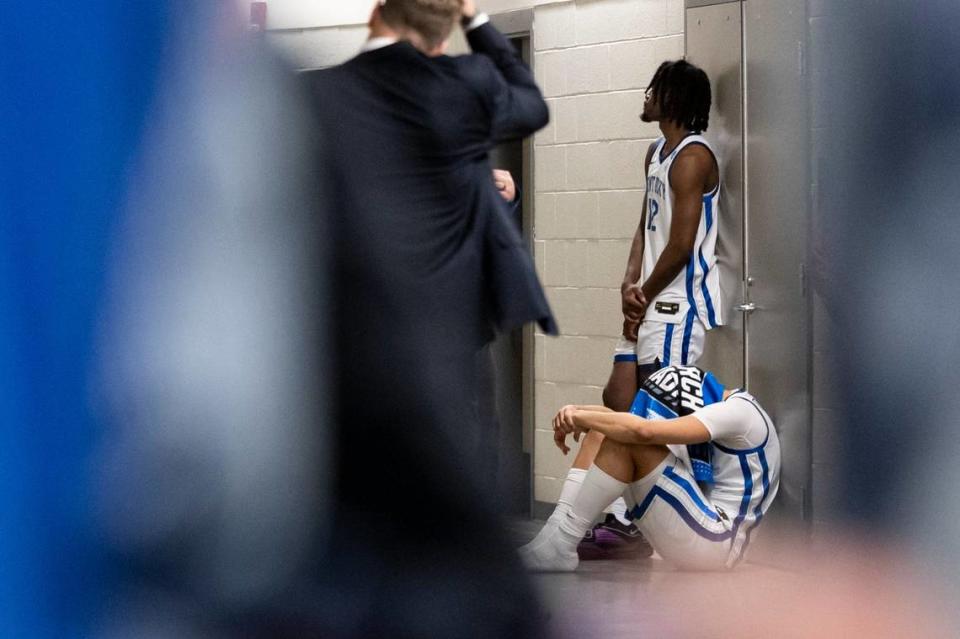Kentucky’s Tre Mitchell sits next to Antonio Reeves (12) in the hallway after the Wildcats were defeated by Oakland in the first round of at the NCAA Tournament at PPG Paints Arena in Pittsburgh on Thursday. Silas Walker/swalker@herald-leader.com