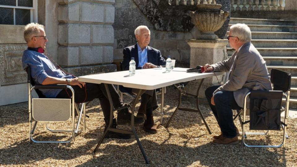 A photo including Stephen Cornwell, John le Carré (David Cornwell) and Simon Cornwell behind-the-scenes of “The Pigeon Tunnel” on Apple TV+