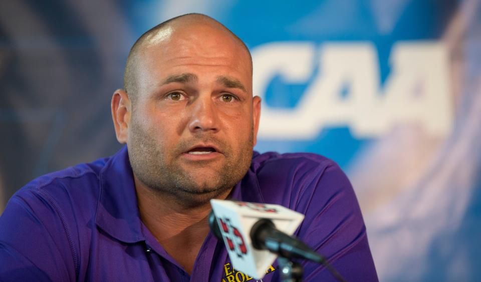 East Carolina baseball coach Cliff Godwin during an NCAA college baseball news conference, Thursday, May 28, 2015, in Coral Gables, Fla. ECU plays Columbia on Friday in an regional tournament game. (AP Photo/J Pat Carter)                                              