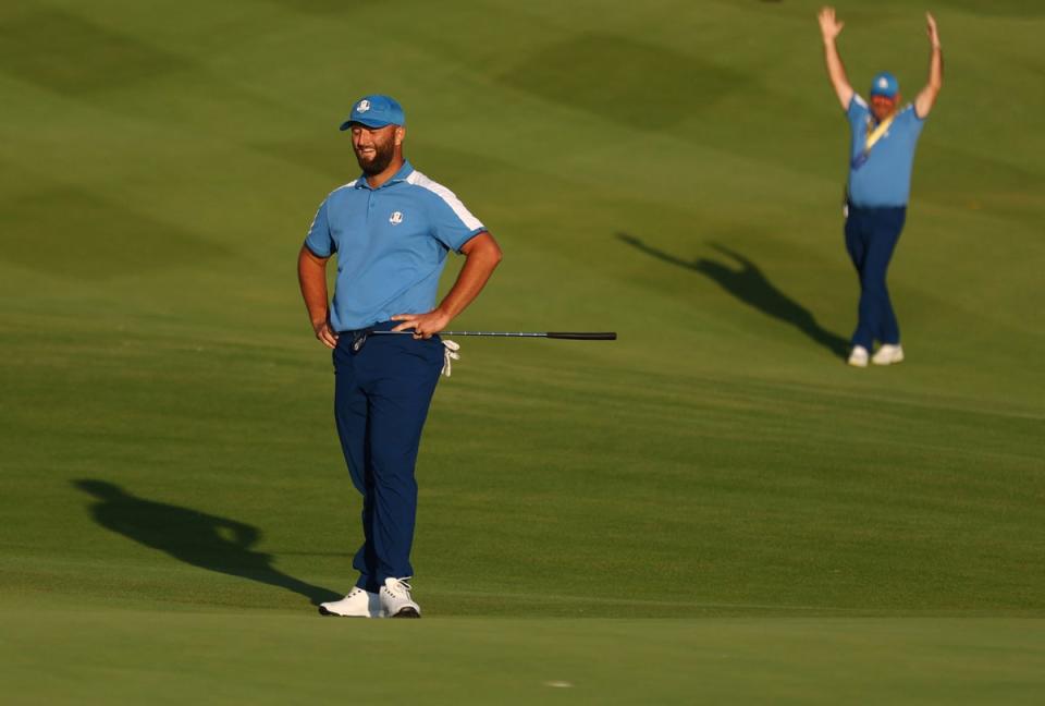 Rahm reacts as his putt drops on the 18th hole (Reuters)