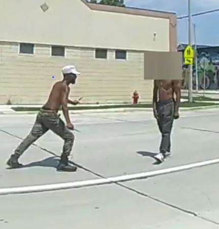 A video from a body-orn camera shows a man later identified as Samuel Sharpe Jr. wielding two steak knives during an argument with another man. As Columbus police ran toward the confrontation, police repeatedly tell Sharpe to drop the knives. Sharpe then lunges toward the other man, and the officers opened fire.