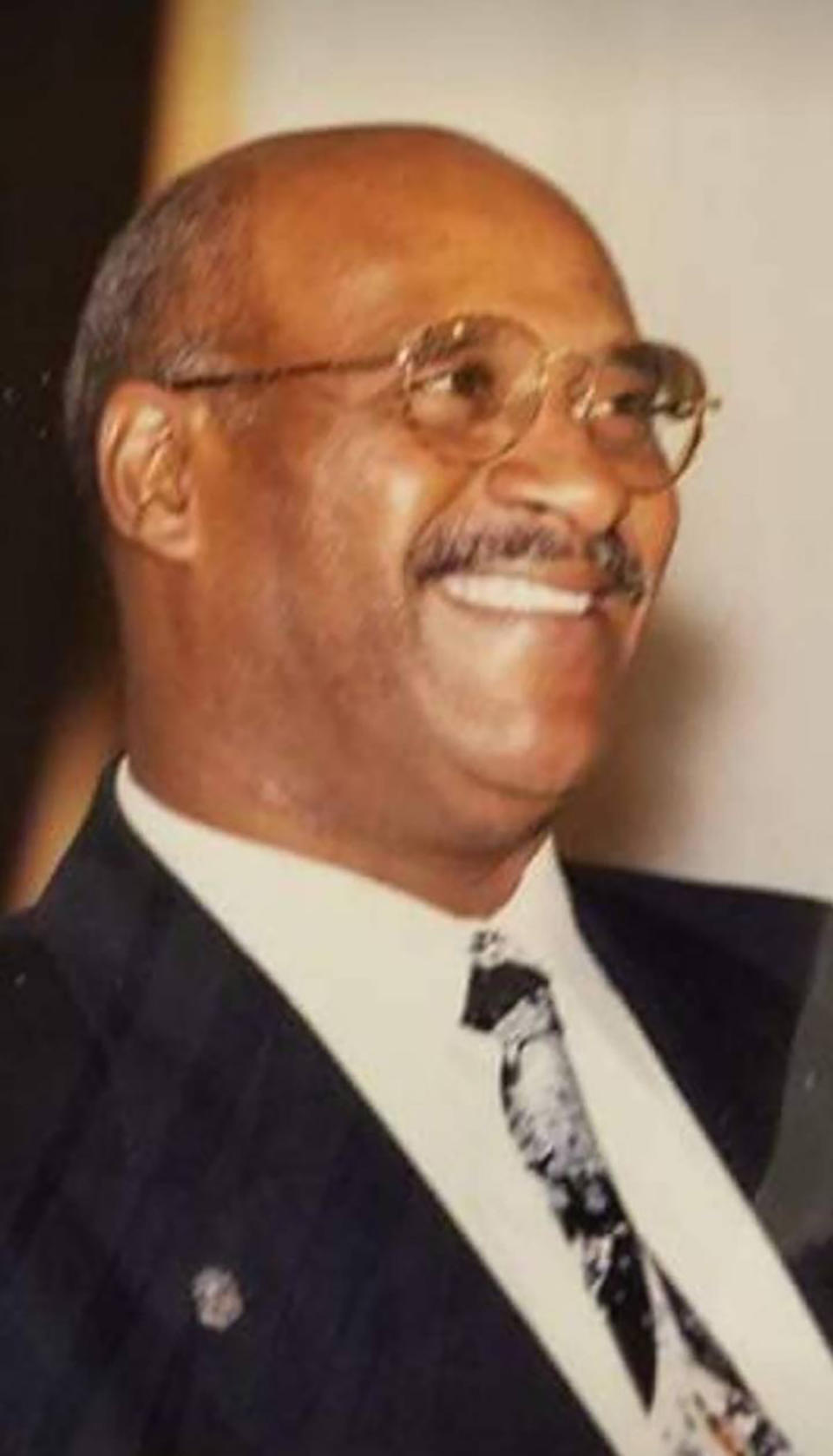 This photo provided by the League of Martin shows Lenard "Lenny" Wells. Wells, a former Milwaukee police lieutenant and a mentor to many in the black community, has died of the new coronavirus. (League of Martin via AP)