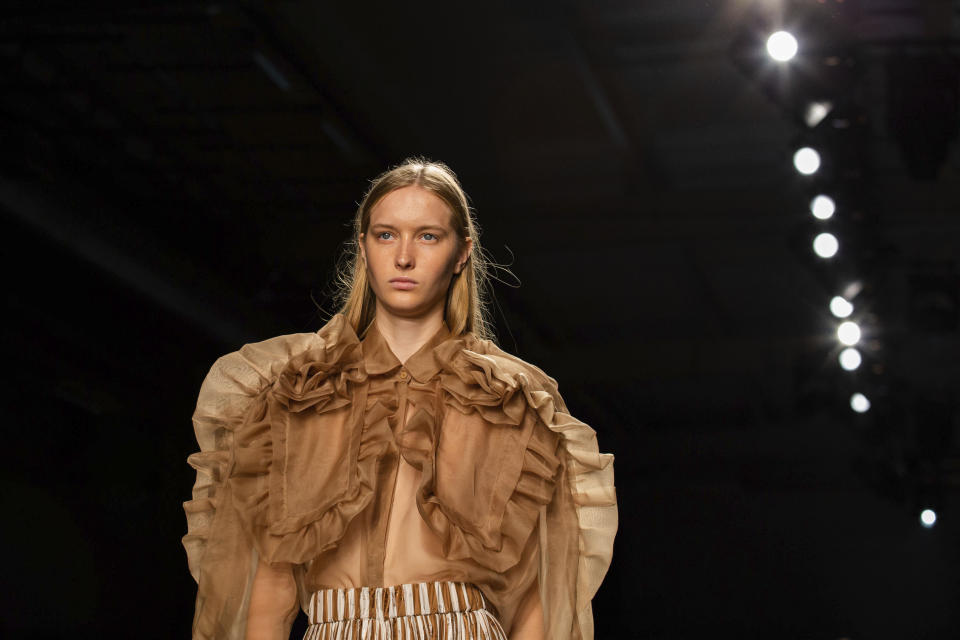 Models display creations by Preen by Thornton Bregazzi at the Spring/Summer 2020 fashion week runway show presented in London, Sunday, Sept. 15, 2019. (Kate Collins/PA via AP)