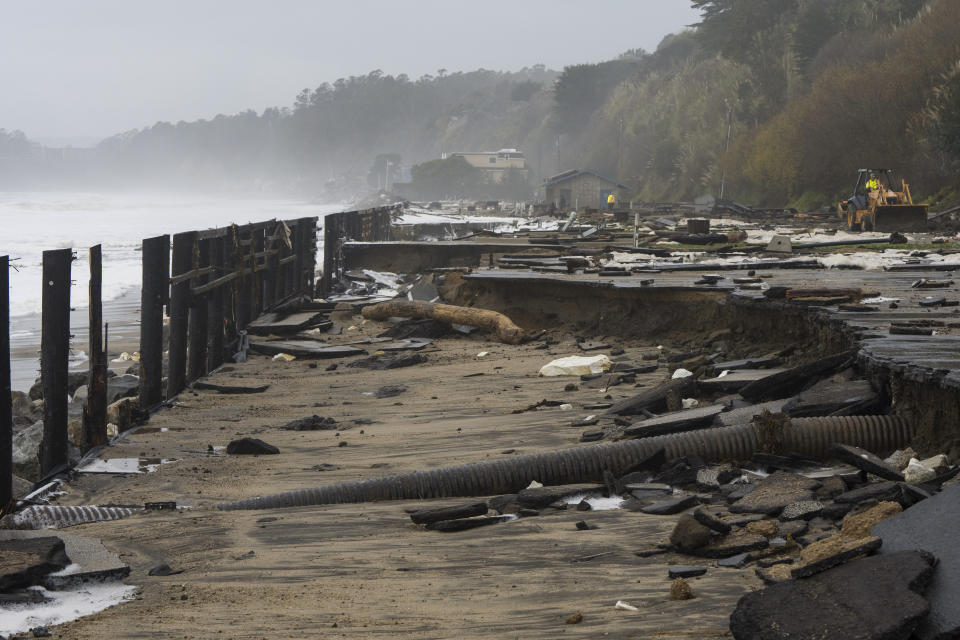 A parking lot at Seacliff State Beach is damaged by heavy storm surge, Thursday, Jan. 5, 2023, in Aptos, Calif. (AP Photo/Nic Coury)