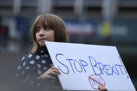 FILE PHOTO: Protesters participate in an anti-Brexit demonstration at City Hall in central Belfast, Northern Ireland October 20, 2018. REUTERS/Clodagh Kilcoyne/File Photo