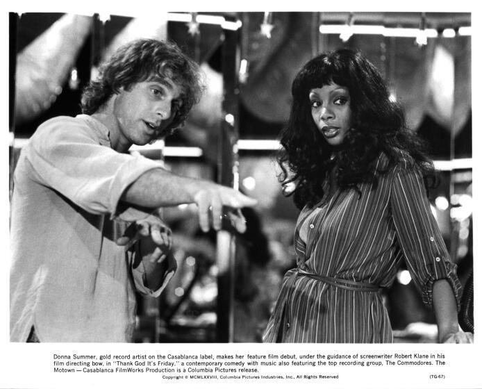 Director Robert Klane instructs actress Donna Summer on the set of the Columbia Pictures movie " Thank God It's Friday" in 1978. (Photo by Michael Ochs Archives/Getty Images)