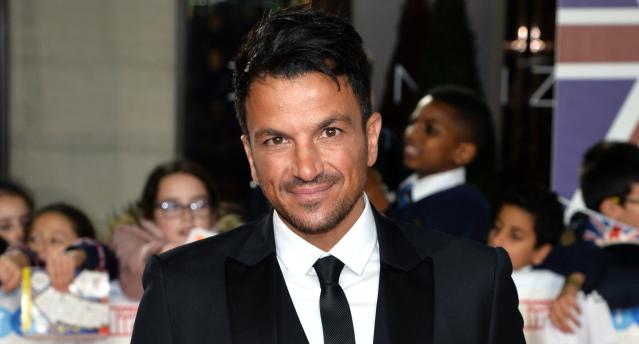 Peter Andre denies he stuffed 'socks' down his pants as he shares