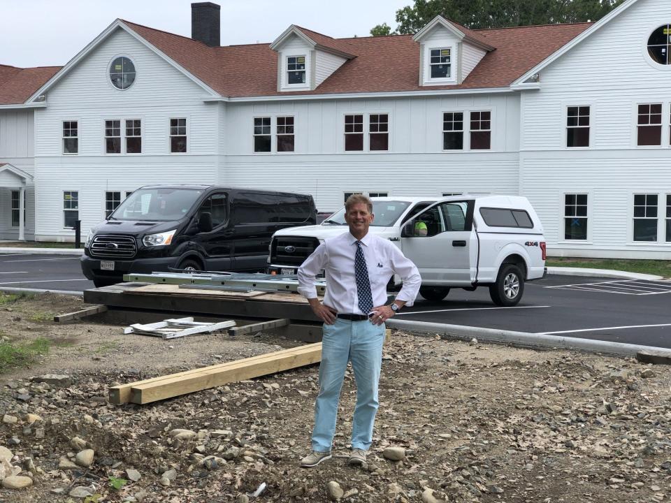 John Martin, a managing partner at The Colony in Kennebunkport, Maine, is seen here on Monday, Aug. 7, on the hotel's north campus, where a new building offering more than 40 new rooms, is currently under construction and is expected to be completed in the fall of 2023.