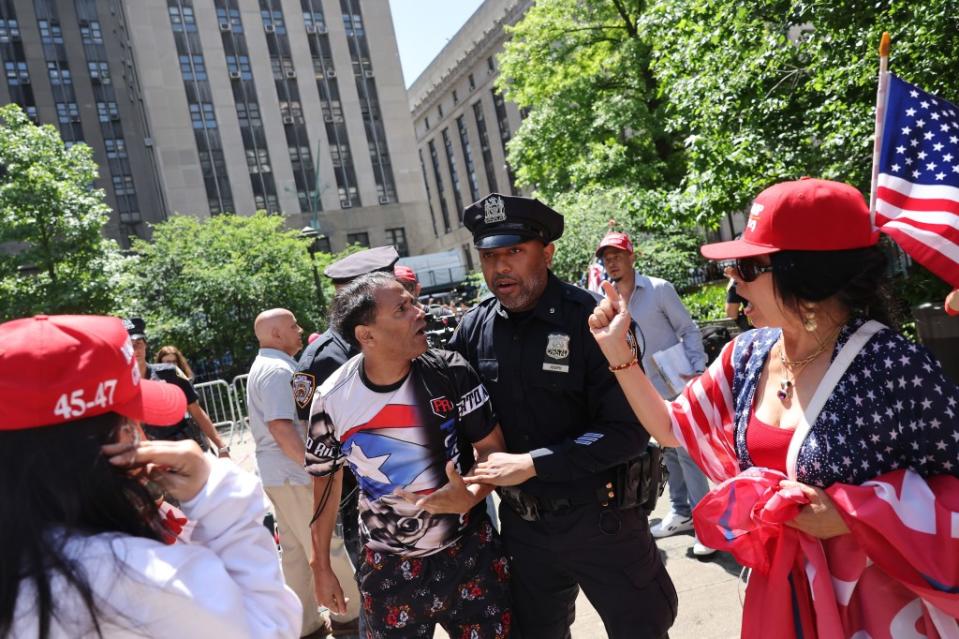 A fight broke out among protesters outside the courthouse during former President Donald Trump’s hush money trial on May 28, 2024. Photo by Michael M. Santiago/Getty Images