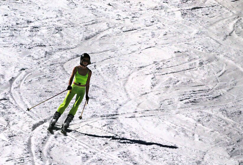 132388Mammoth Lakes, CA - A skier glides down Mammoth Mountain on a warm Thursday, July 27, 2023. The summer skiing season at Mammoth has been extended because of last winter's record snowfall in the Sierra Nevada Mountains. (Luis Sinco / Los Angeles Times)