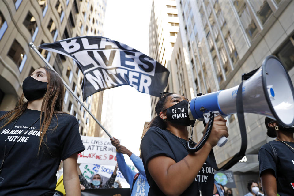 Tiana Day (right) leads the March 4 Our Future down Montgomery Street in San Francisco on Nov. 1, 2020. (Photo: San Francisco Chronicle/Hearst Newspapers via Getty Images)