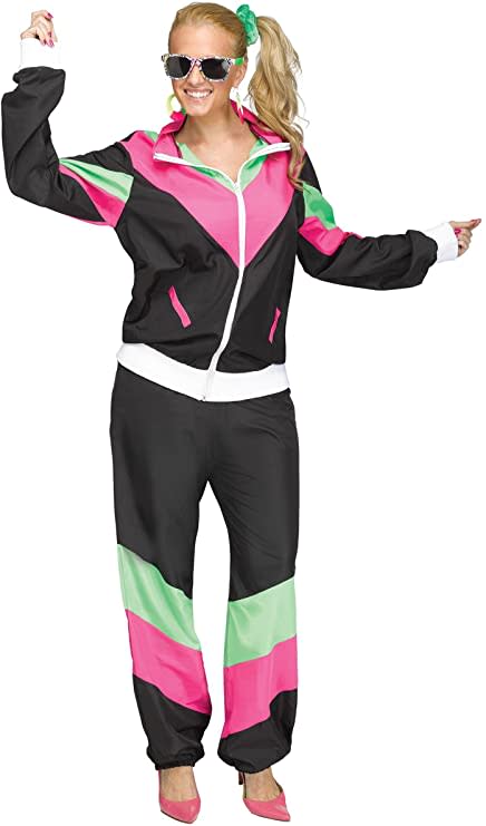 Woman dressed in black, pink and green 80's Track Suit costume with side ponytail and sunglasses