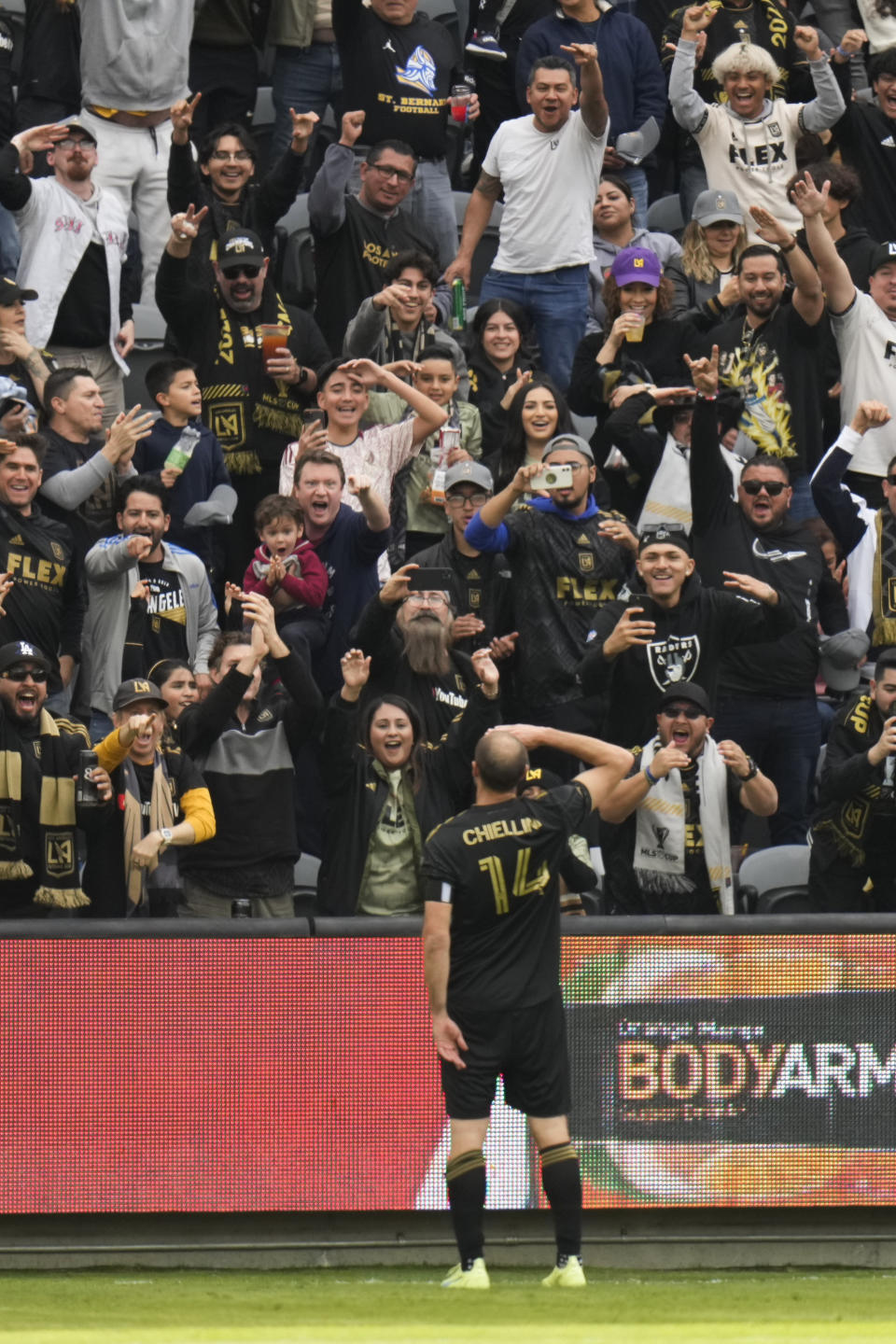 Los Angeles FC defender Giorgio Chiellini (14) salutes to the fans after scoring a goal during the first half of an MLS soccer match against the Portland Timbers Saturday, March 4, 2023, in Los Angeles. (AP Photo/Jae C. Hong)