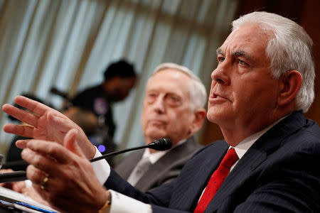 U.S. Secretary of State Rex Tillerson (R) and Defense Secretary James Mattis testify about authorizations for the use of military force before the Senate Foreign Relations Committee on Capitol Hill in Washington, U.S. October 30, 2017. REUTERS/Jonathan Ernst