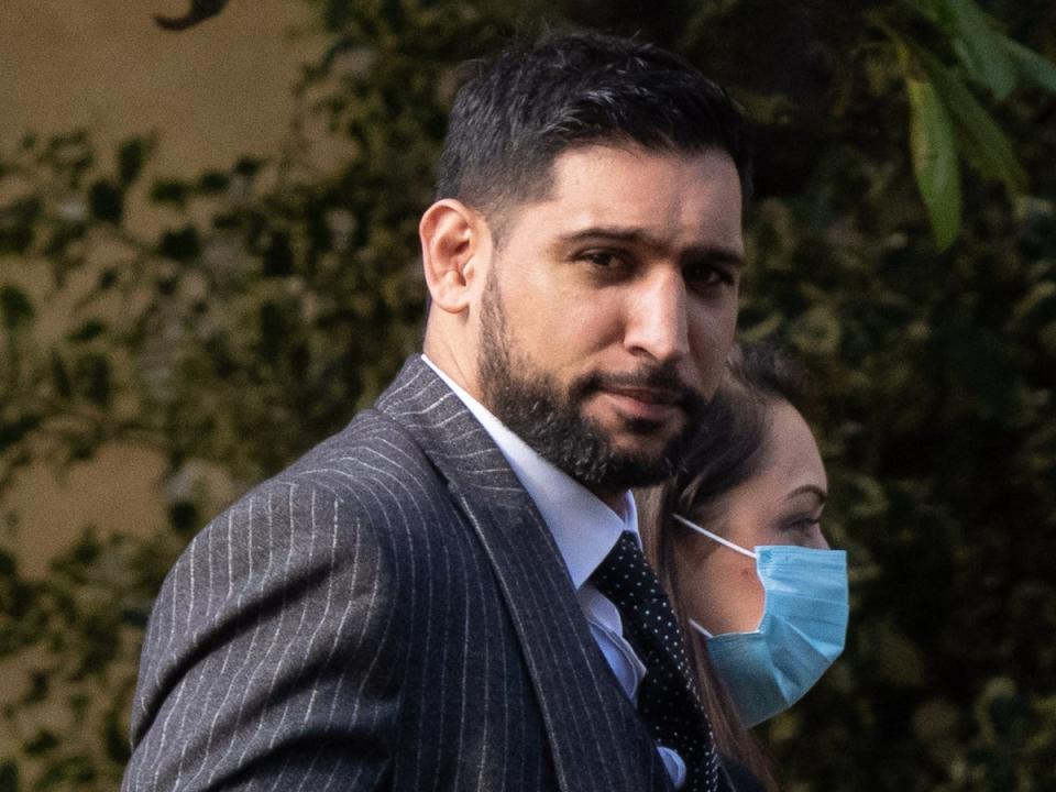 Former world boxing champion Amir Khan arriving at Snaresbrook Crown Court on 14 March (Jeff Moore/PA Wire)