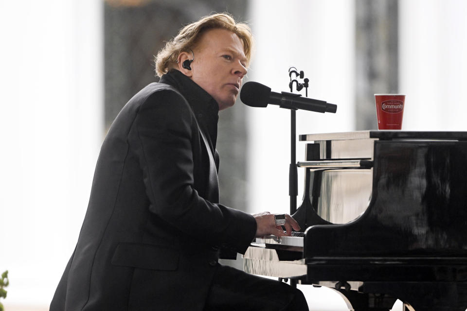 Axl Rose performs during a memorial service for Lisa Marie Presley Sunday, Jan. 22, 2023, in Memphis, Tenn. She died Jan. 12 after being hospitalized for a medical emergency and was buried on the property next to her son Benjamin Keough, and near her father Elvis Presley and his two parents. (AP Photo/John Amis)