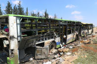 Damaged buses are seen after an explosion yesterday at insurgent-held al-Rashideen, Aleppo province, Syria April 16, 2017. REUTERS/Ammar Abdullah