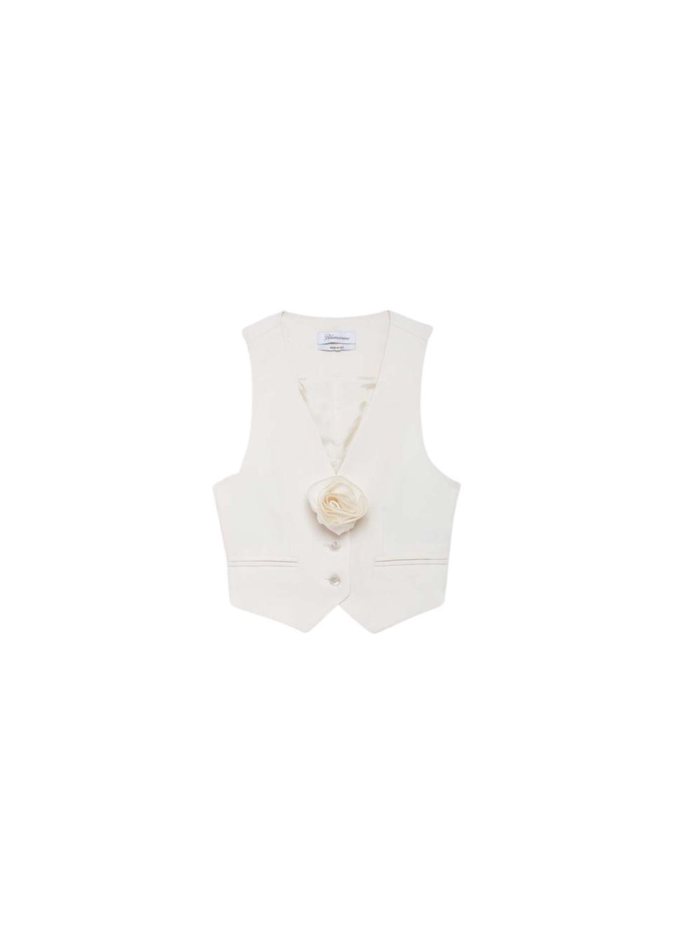 <p><a href="https://shop.harpersbazaar.com/vest-with-rose.html" rel="nofollow noopener" target="_blank" data-ylk="slk:Shop Now;elm:context_link;itc:0;sec:content-canvas" class="link ">Shop Now</a></p><p>Vest with Rose</p><p>$695.00</p>