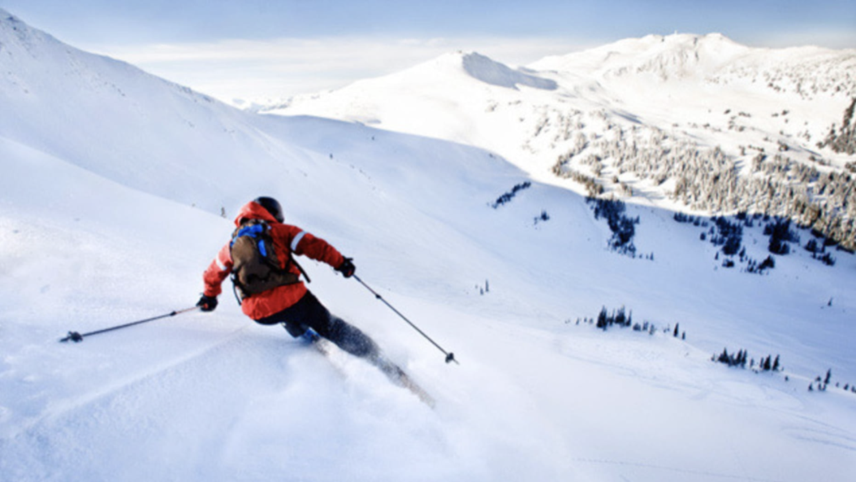 a person skiing down a mountain