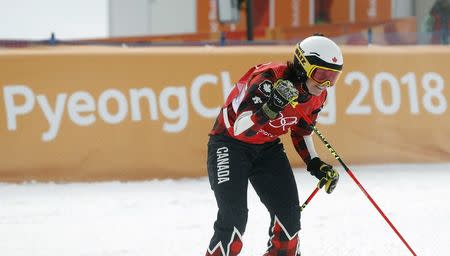 Freestyle Skiing - Pyeongchang 2018 Winter Olympics - Women's Ski Cross Finals - Phoenix Snow Park - Pyeongchang, South Korea - February 23, 2018 - Kelsey Serwa of Canada reacts after winning the event. REUTERS/Issei Kato