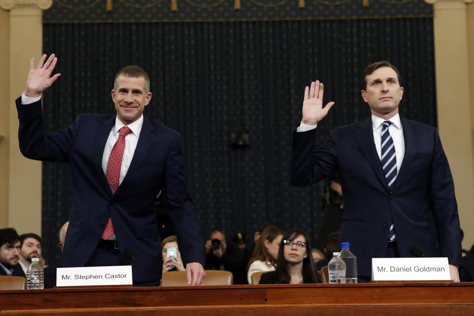 Republican staff attorney Steve Castor, left, and Democratic staff attorney Daniel Goldman and are sworn in to testify as the House Judiciary Committee hears investigative findings in the impeachment inquiry of President Donald Trump, Monday, Dec. 9, 2019, on Capitol Hill in Washington. (AP Photo/Alex Brandon)
