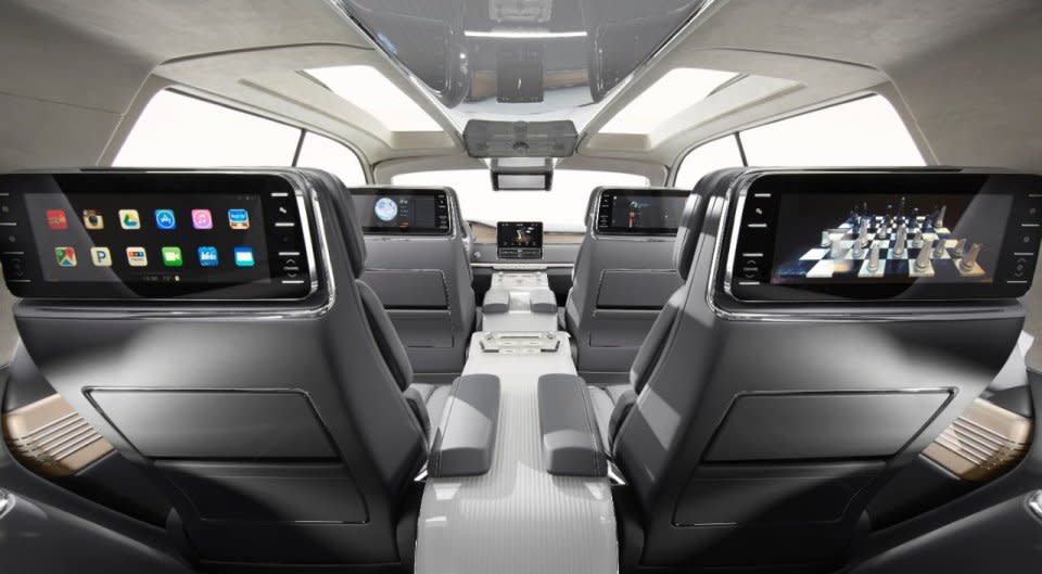 <h3>The six seats inside can be adjusted 30 different ways, and there’s entertainment consoles on the back of four seats so passengers can watch TV or play games.</h3>